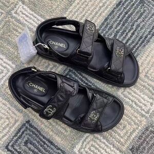 CHANEL Black Sandals with Silver Accents